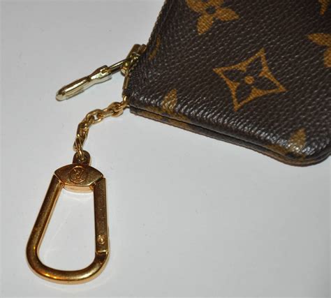 louis vuitton change purses.